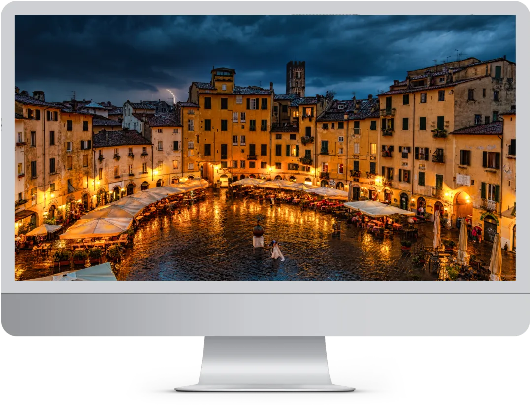 Computer con Immagine di Lucca che mostra il servizio di realizzazione siti web Lucca